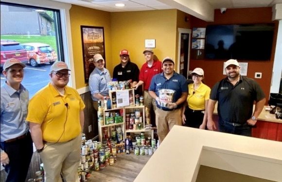 North Liberty Staff with Canned Good Donations