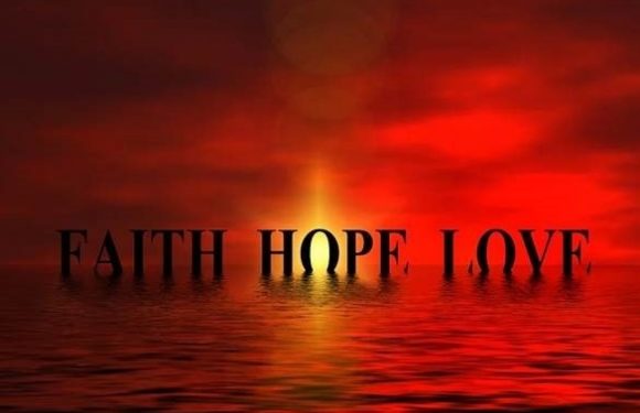 Red sunset with words faith, hope, love