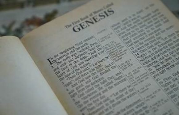 Bible open to Genesis 1