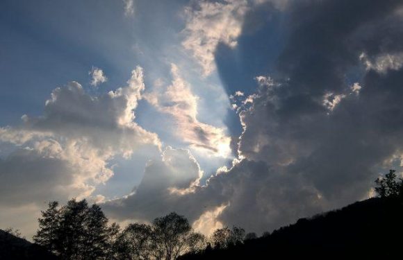 sun shining through clouds