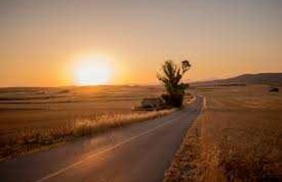 Sun rising over the road, new day and new path
